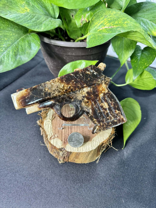 Carved Stone Pistol Sculpture